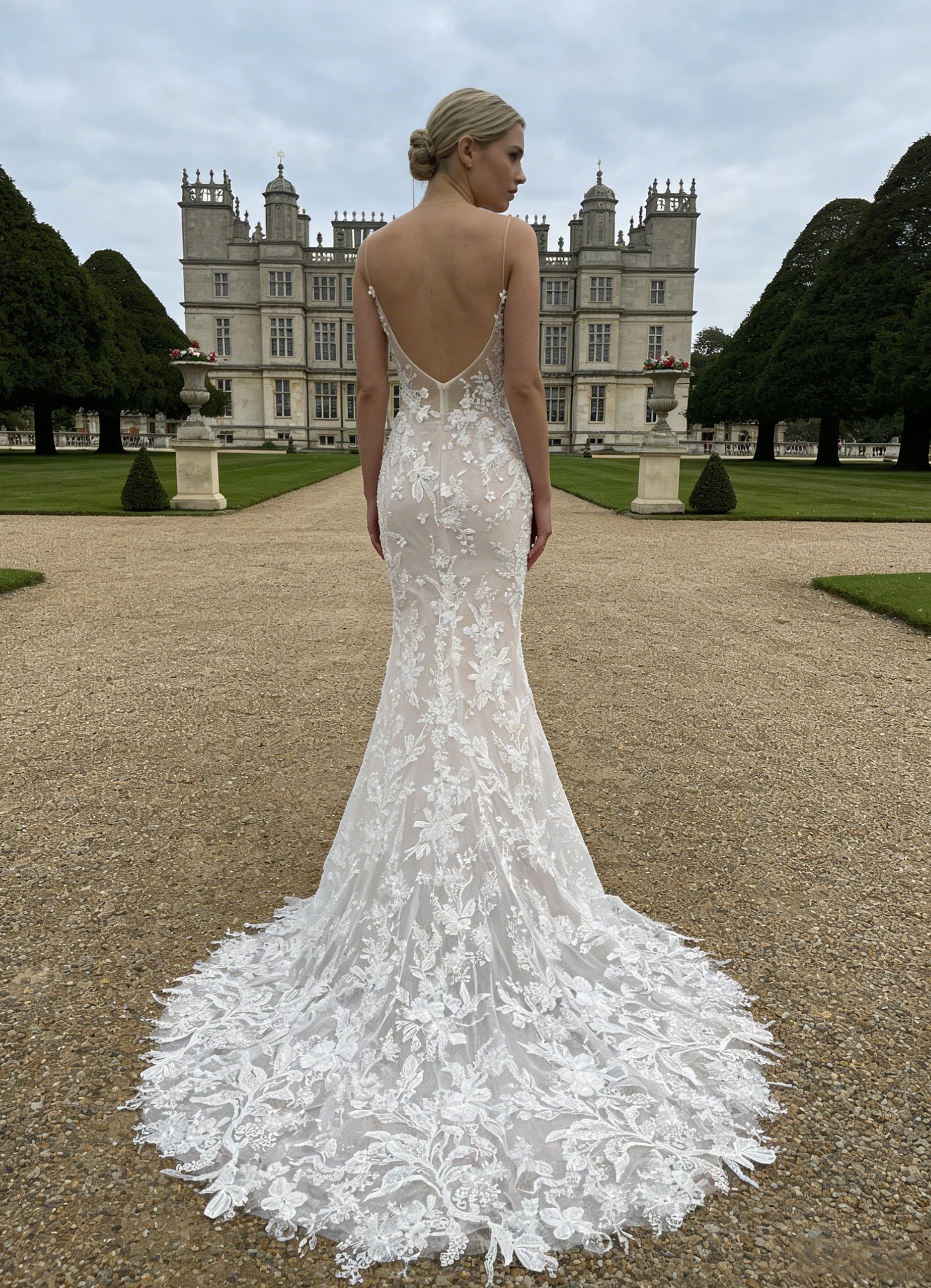W014 Elegant Spaghetti Strap Mermaid Wedding Dress with Deep V Neck & Lace Appliqué Train